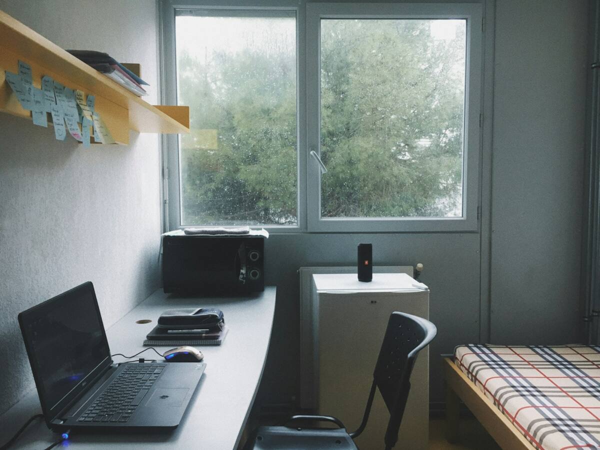 Durable phone cases for college students: dorm room desk setup