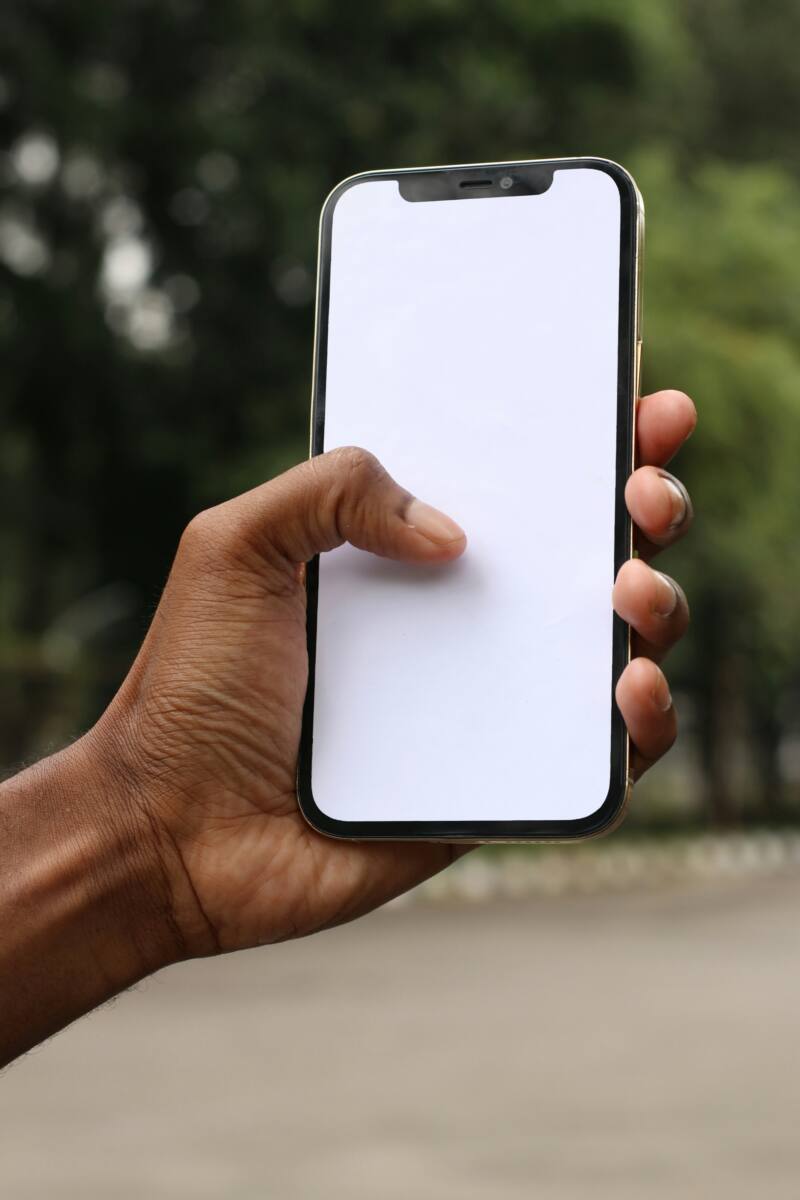 iPhone custom case ideas scene: person holding an iPhone with a custom case