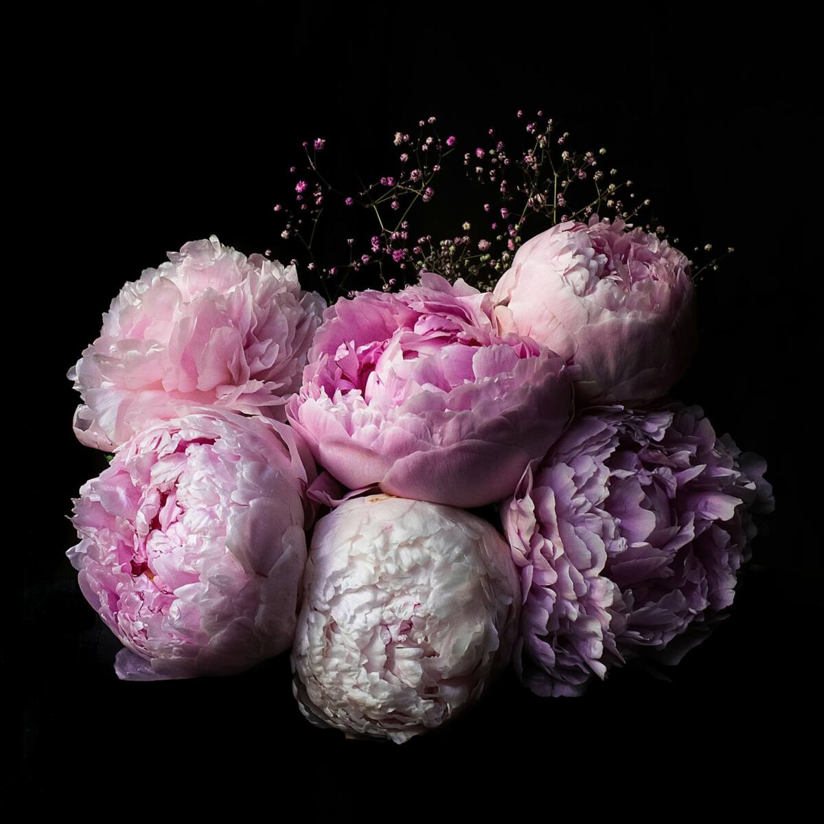 Mothers day phone case gift guide: pink and white peonies alongside a custom case