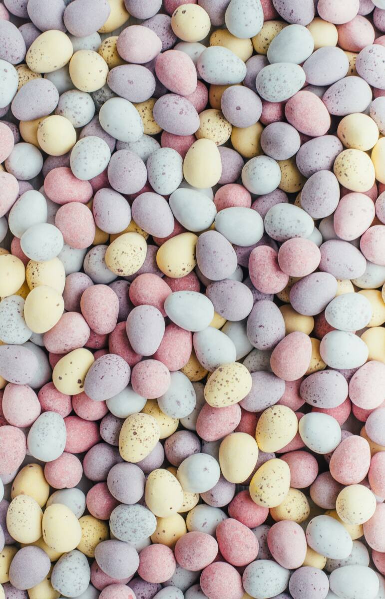 Easter phone case ideas: pastel colored Easter eggs in soft spring tones