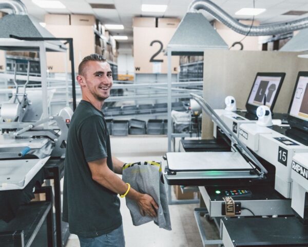 Inside a print on demand facility with capacity to produce gear for every team and size