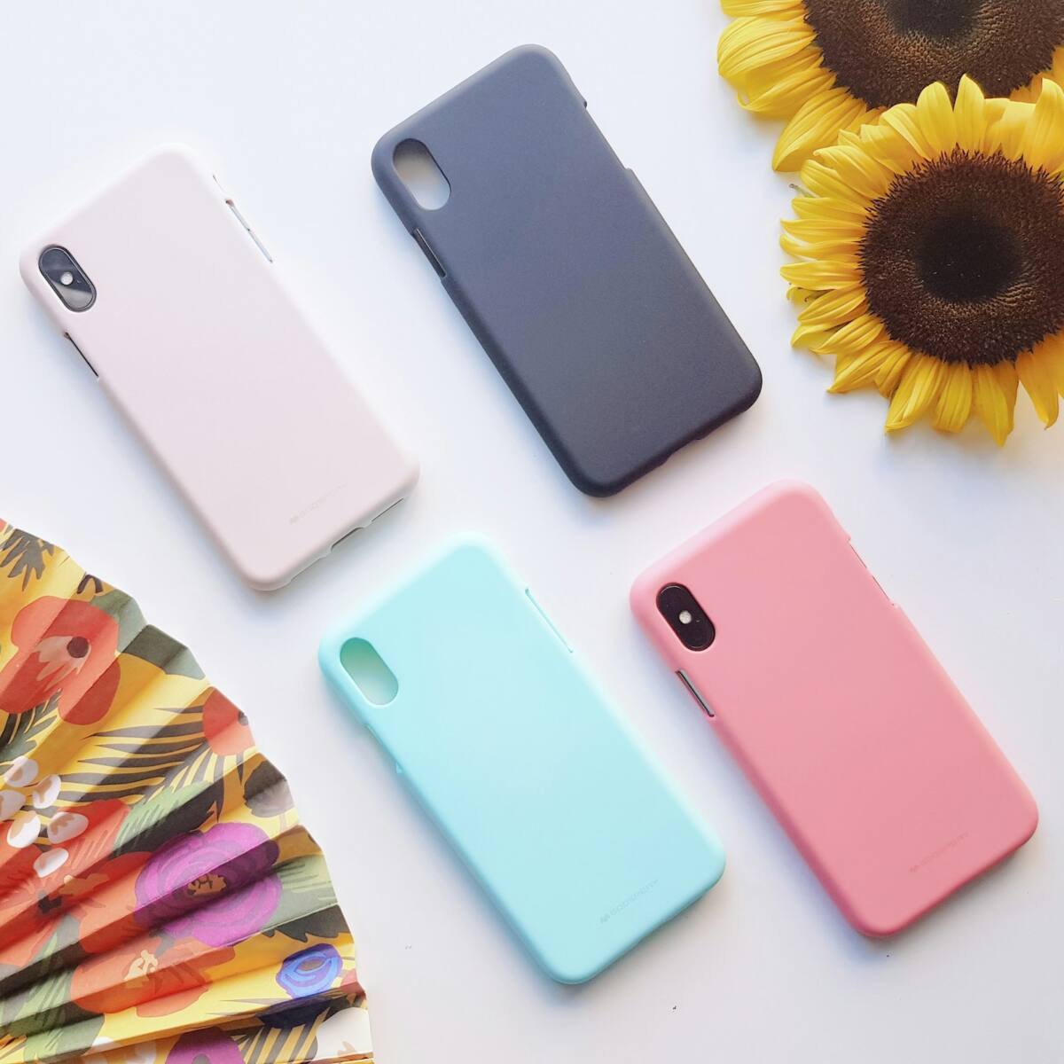 Colorful y2k phone case designs in pink, teal, and coral tones